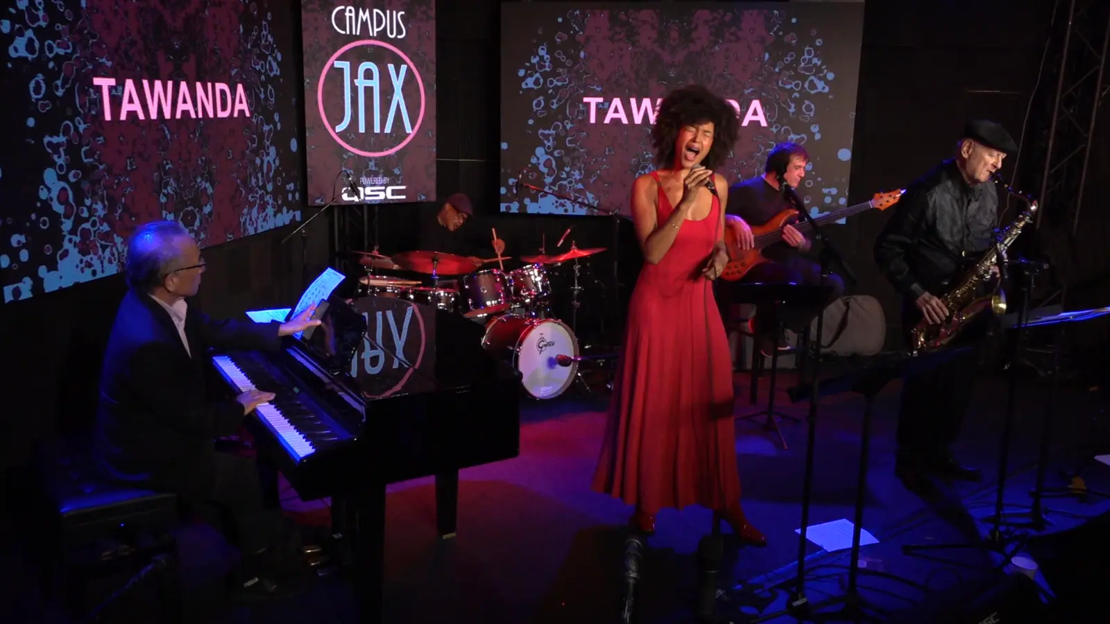 Tawanda performing at Campus JAX